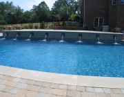 Swimming pool water features
